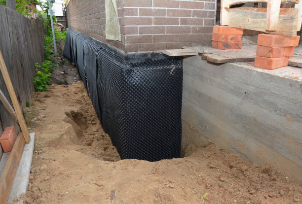 Happy homeowners after waterproofing job in North Fairfield